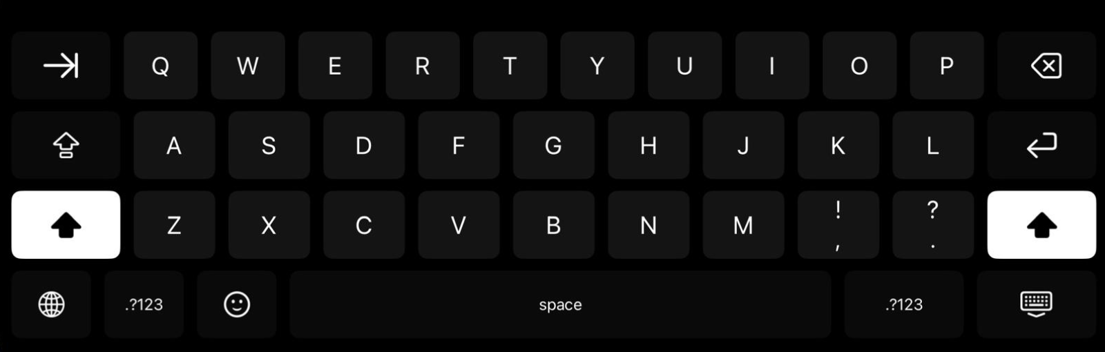Black Keyboard on the same iPad in landscape, shifted to uppercase: a pure black background with near-black keycaps and crisp white letters, with both shift keys lit white. The globe key sits in the bottom left corner, and the two keys right of M each carry two glyphs, an exclamation mark over a comma and a question mark over a period.